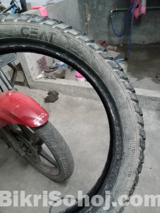 Ceat 100/90-18 grip tyre for sale